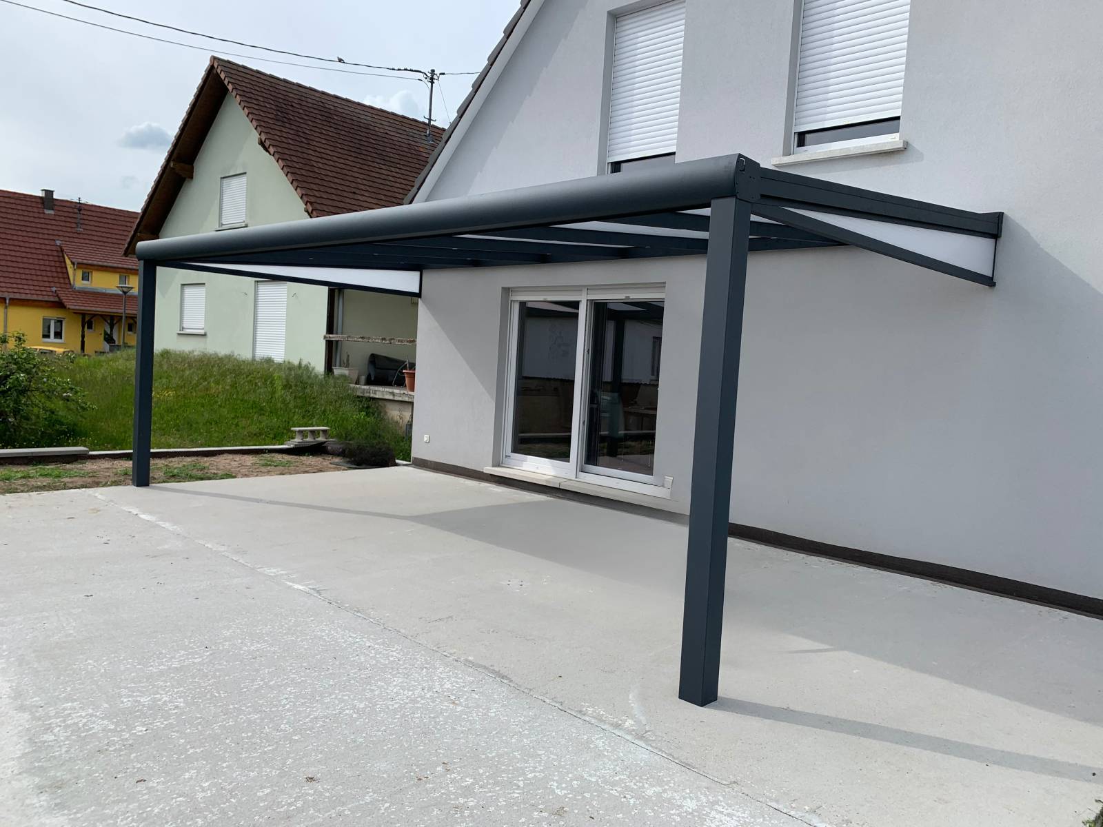 Devis pour la conception d'une pergola sur mesure en aluminium avec pose adossée à une maison à Strasbourg